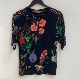 Black floral t-shirt with geometric shoulder-sleeves